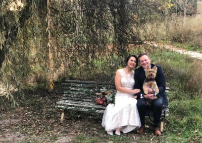 Bride and groom with their dog